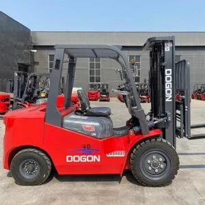 A red DOGON 4 ton diesel forklift parked in front of a warehouse.