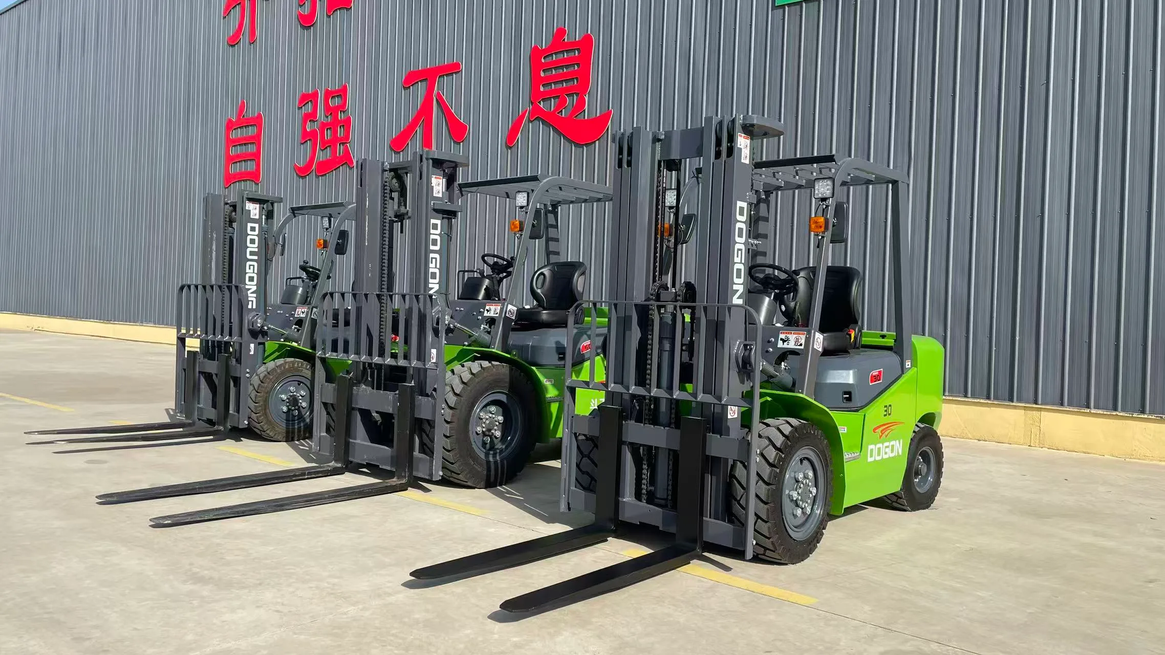 Three-ton electric forklifts lined up side by side